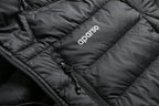 Close-up of a black puffer jacket with 'aparso' branding. Aparso