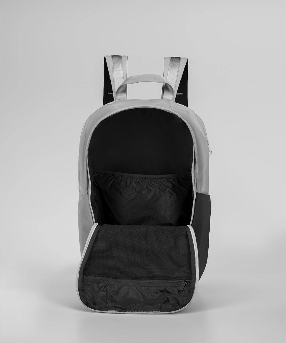 Gray and black backpack on a light gray background RYU