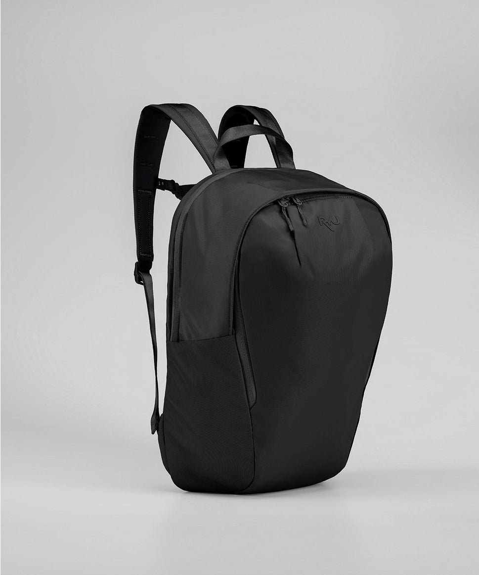 Black backpack on a light gray background RYU