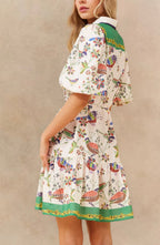 ANNICK Leontine Boho Bird Print Mini Dress Bell Sleeves Belt White side view model