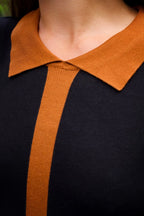 Close-up detail of rust orange contrast collar on Clarissa dress
