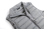 Gray puffer vest on a white background Aparso
