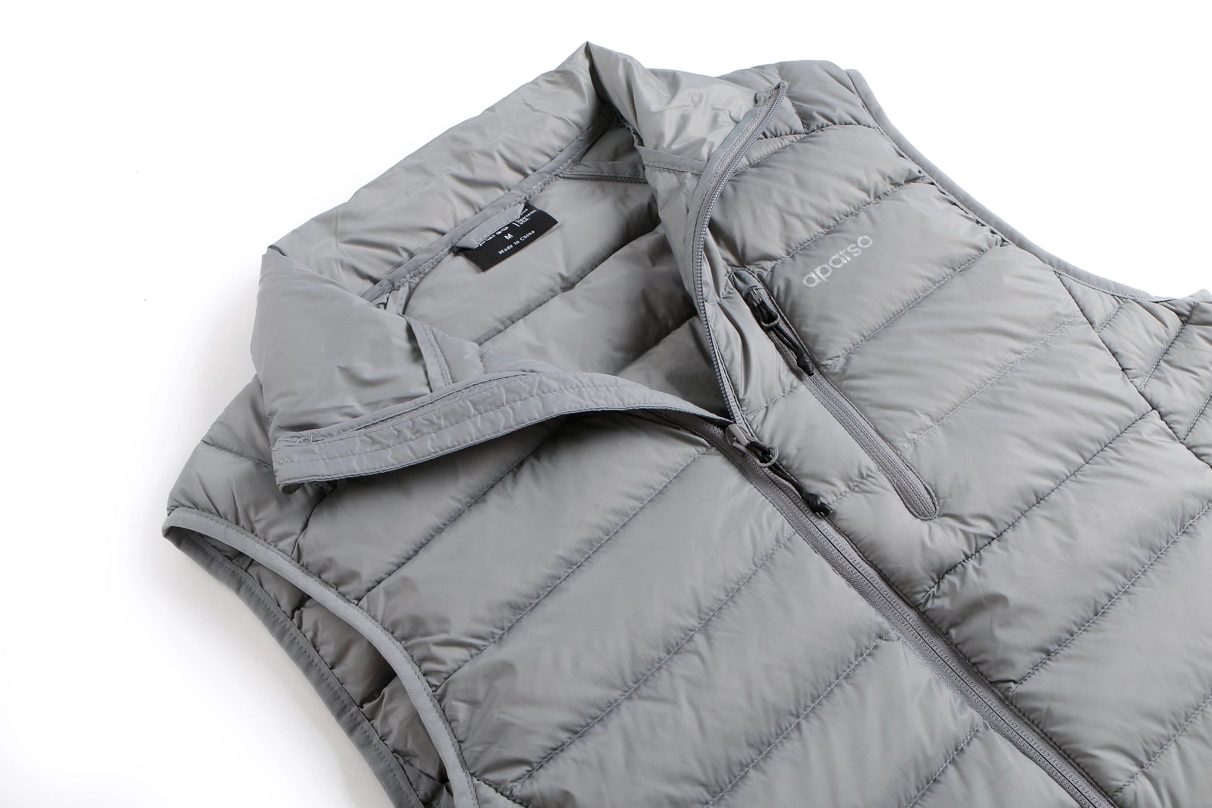 Gray puffer vest on a white background Aparso