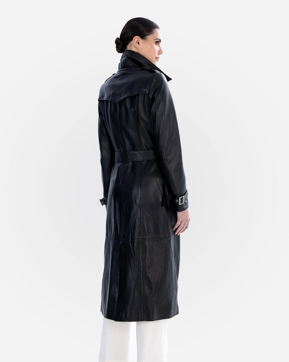 Person wearing a black leather trench coat on a white background Cuir Dimitri