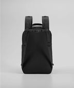 Black backpack on a light gray background RYU