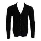 Black cardigan on a mannequin against a white background Maison Leneveu