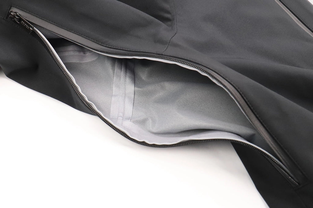 Close-up of a gray jacket with a zipper on a white background Aparso