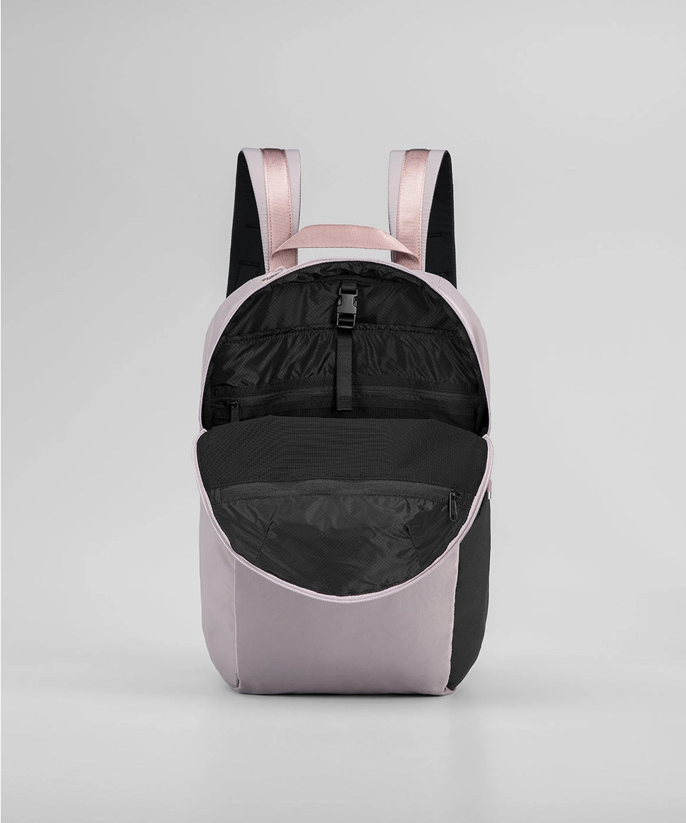 Backpack with pink straps on a gray background RYU