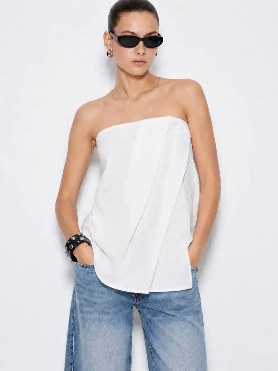 White linen folded strapless bandeau top with asymmetric front pleats and curved hemline - ANAZ Linen Folded Strapless Bandeau Top White