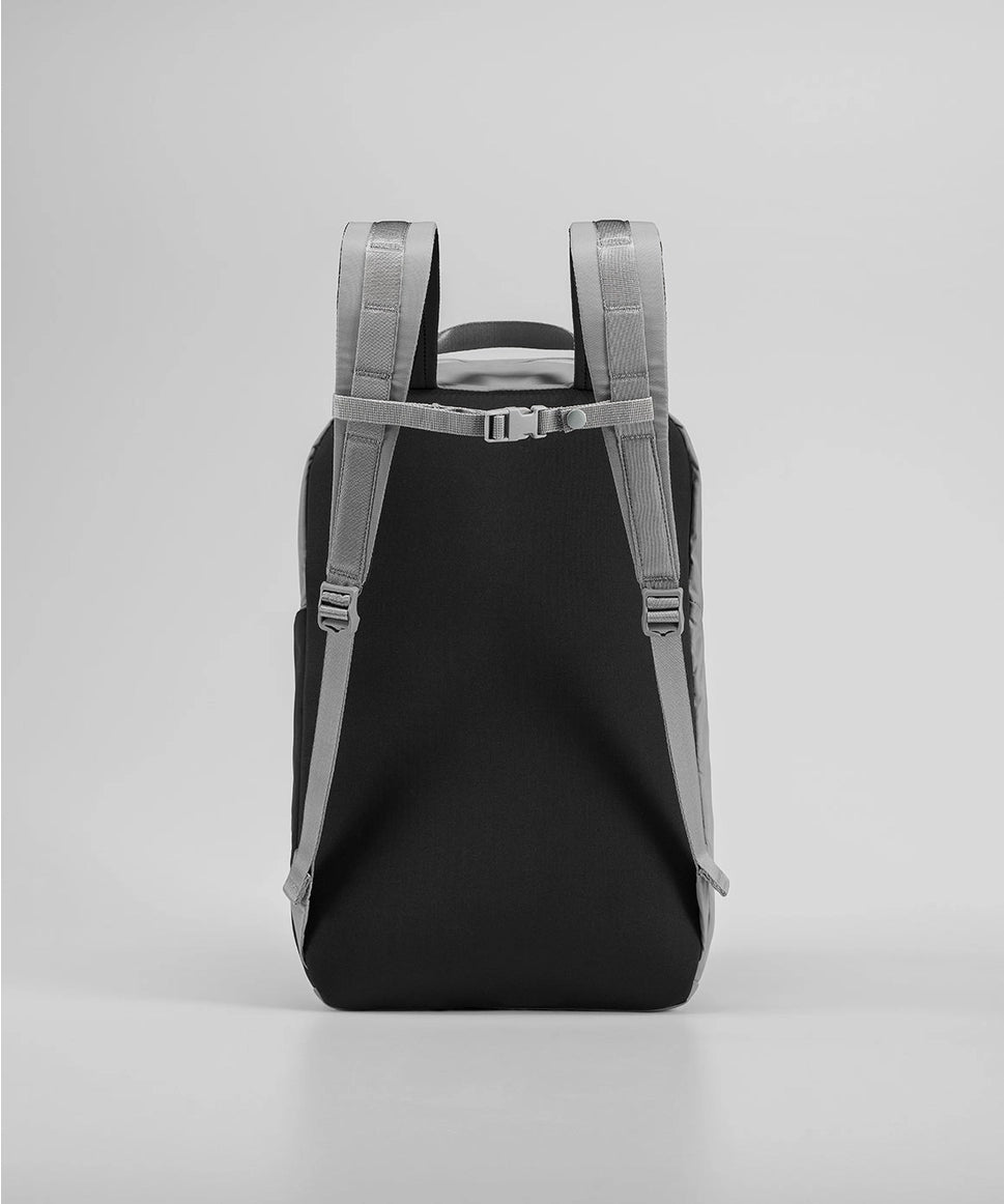 Black backpack with gray straps on a light gray background RYU