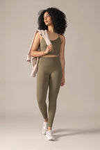 Woman wearing olive activewear set Rose Boreal Contour Seamless Bra lifestyle

