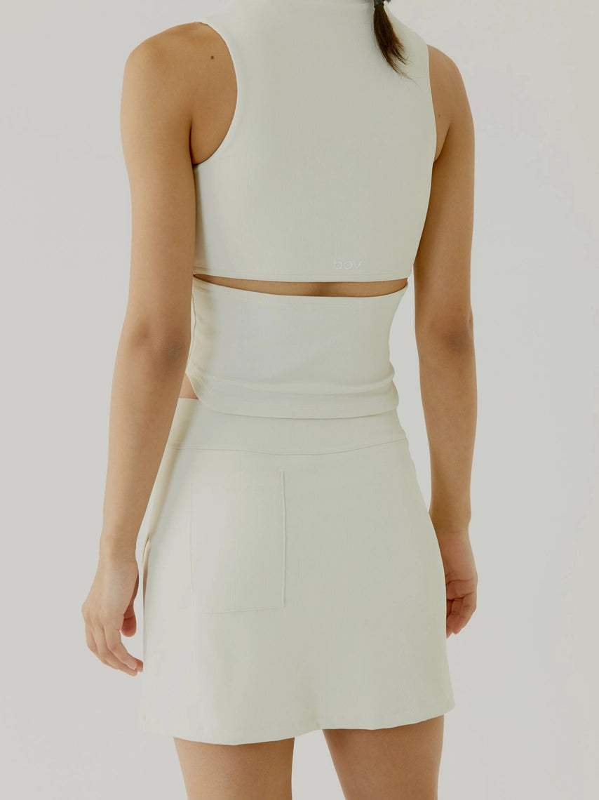 Cream BOV two-piece skirtoutfit on a plain background