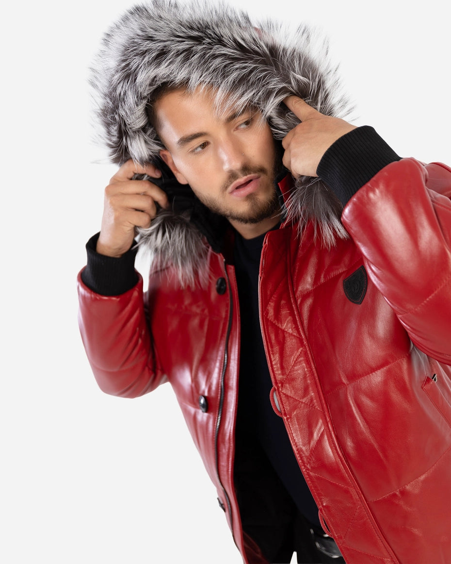 Man wearing a red leather jacket with a fur-lined hood on a white background Cuir Dimitri