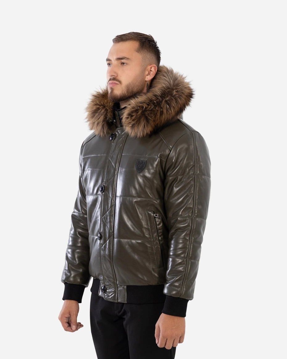 Man wearing a metallic silver jacket with a fur-lined hood on a white background Cuir Dimitri