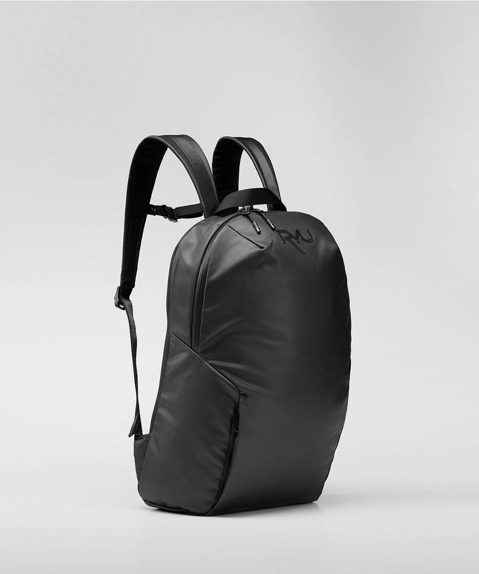 Black backpack on a light gray background RYU