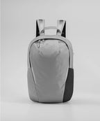 Gray backpack with black accents on a light gray background RYU