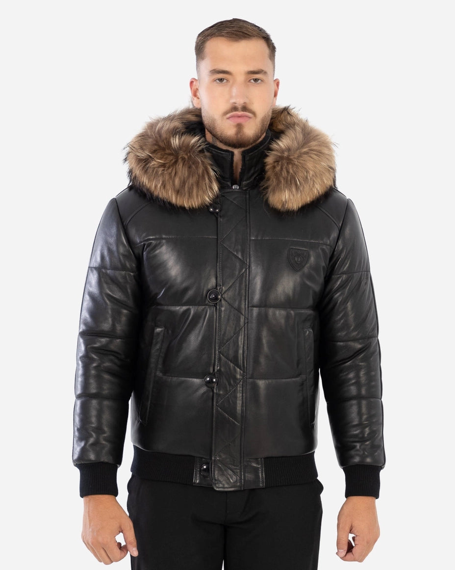 Man wearing a black leather jacket with fur hood on a white background Cuir Dimitri