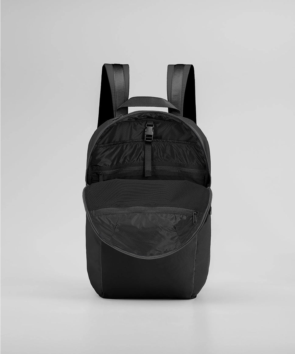 Black backpack on a light gray background RYU