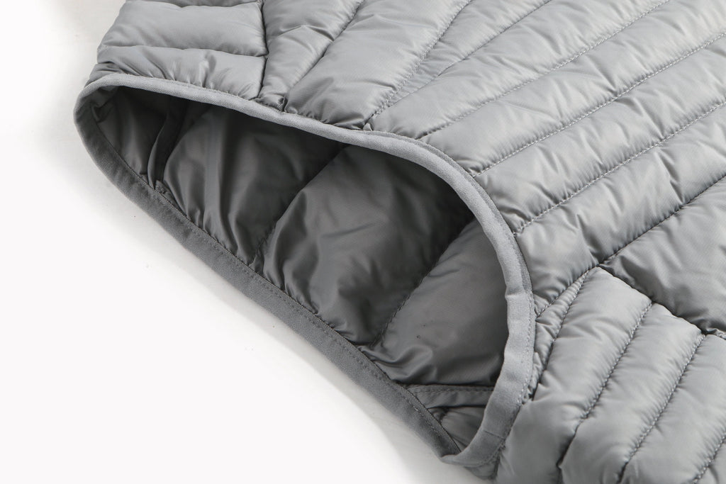 Gray quilted jacket on a white background Aparso