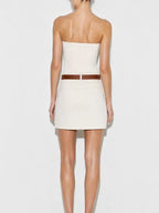 Model wearing ecru denim mini skirt with brown belt back view - ANAZ Denim Mini Skirt with Belt