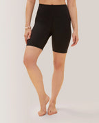 Women wearing black biker shorts on a plain background Rose Boreal
