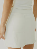 Cream BOV skirt worn by a women on a plain background