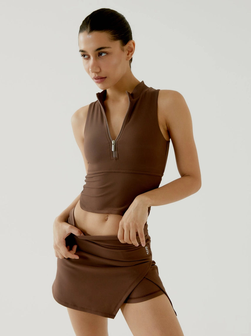 Woman wearing brown BOV Active Harper sleeveless top