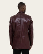 Man wearing a brown leather jacket on a white background Cuir Dimitri