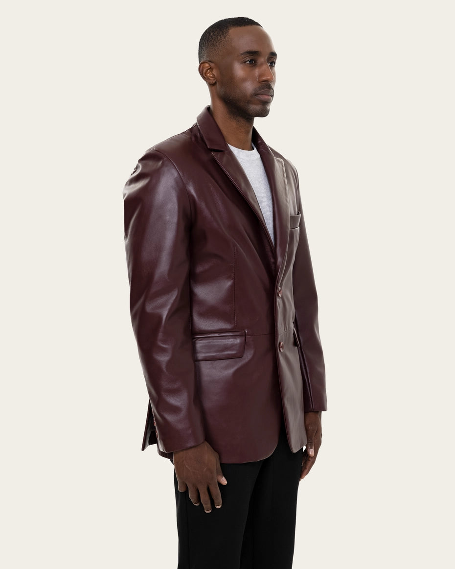 Man wearing a maroon leather jacket on a beige background Cuir Dimitri