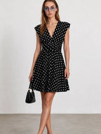 Black and white polka dot ruched waist V-neck mini dress front view with cap sleeves - ANAZ Polka Dot Ruched Waist V-Neck Mini Dress Black