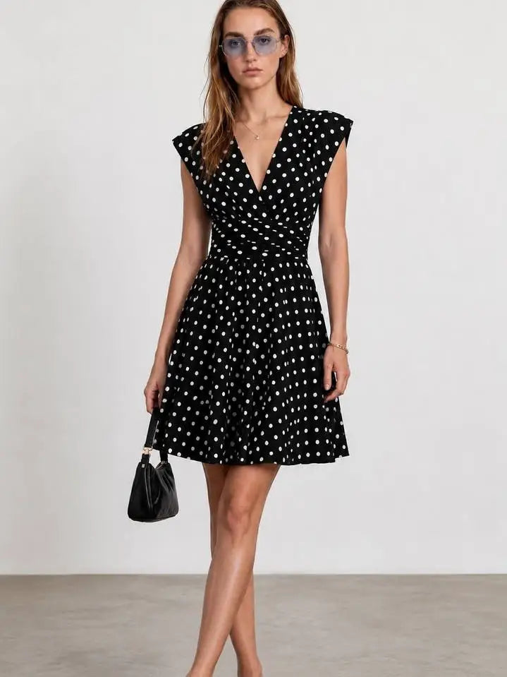 Black and white polka dot ruched waist V-neck mini dress front view with cap sleeves - ANAZ Polka Dot Ruched Waist V-Neck Mini Dress Black