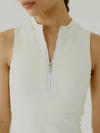 Front view of cream BOV Active Harper top with zipper detail